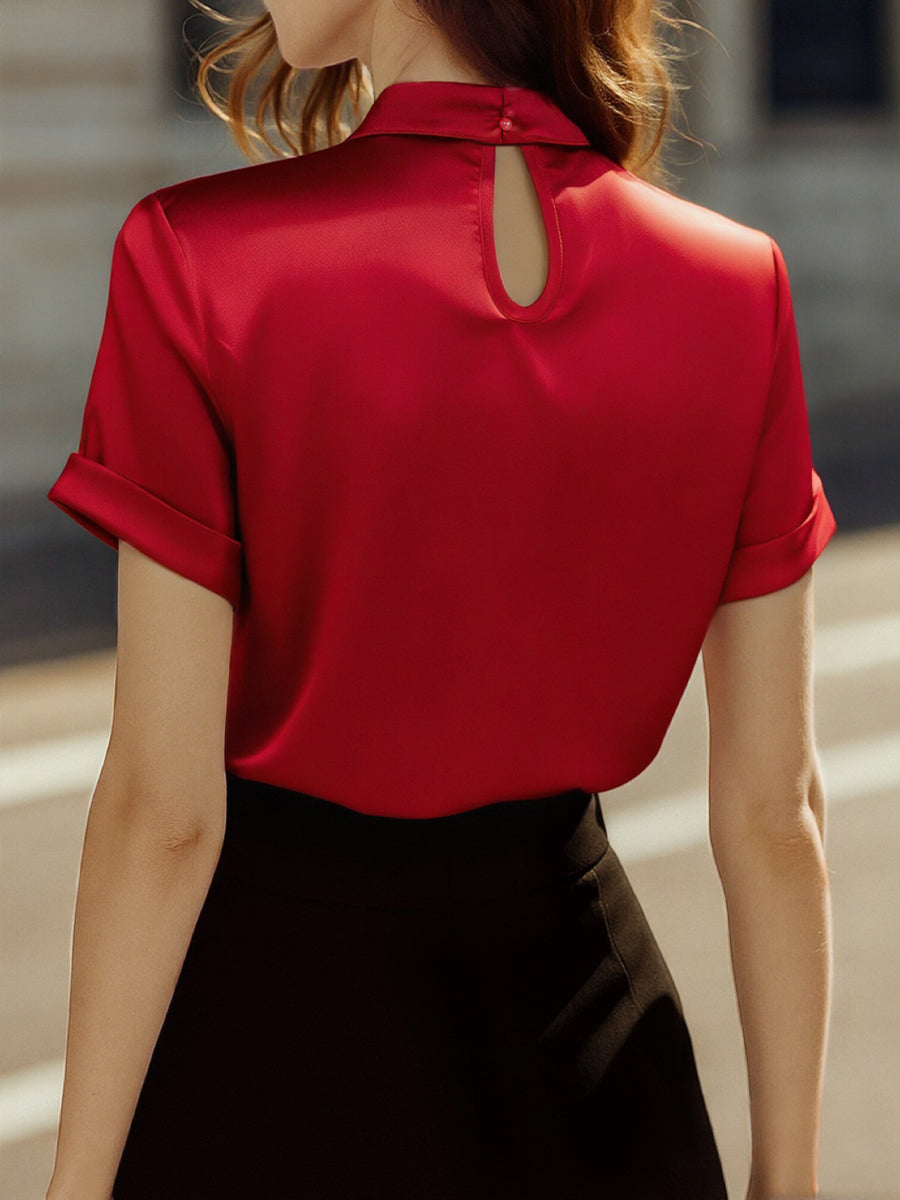 Elegant Black Silk Top with Contemporary Cutout Detail