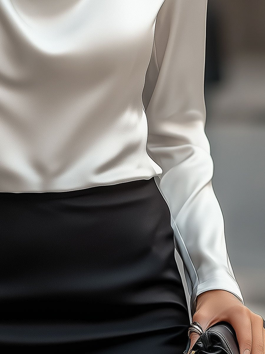 Chic Black Silk Top with Asymmetrical Hemline
