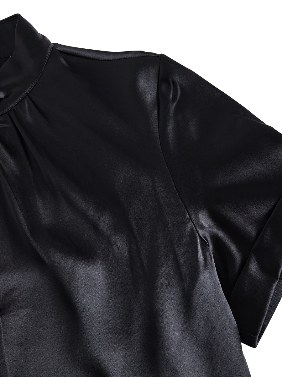 Elegant Black Silk Top with Contemporary Cutout Detail