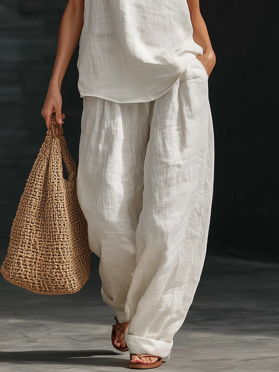 Zoë™ | Sleeveless Ensemble with Flared Trousers